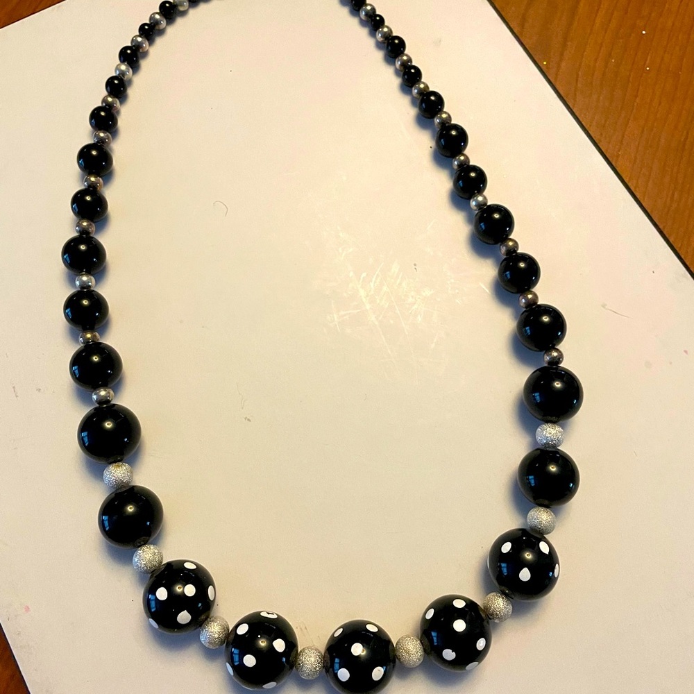 Handcrafted glass beaded necklace.